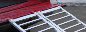 Rubber coated arms on aluminum utility ramp