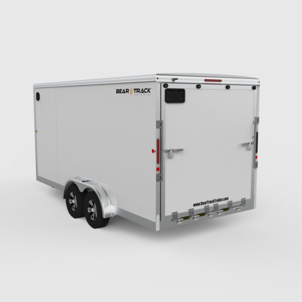 A white enclosed trailer from the rear showing the ramp door.